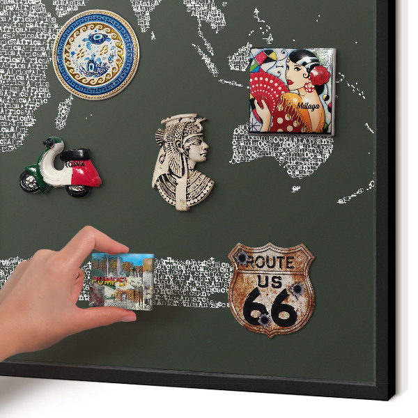 Metal wall board for magnets in a black frame Text map