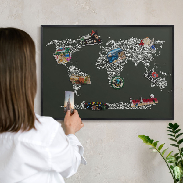Metal wall board for magnets in a black frame Text map