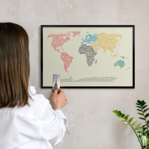 Vacation magnet board with a black frame World map