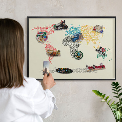 Vacation magnet board with a black frame World map