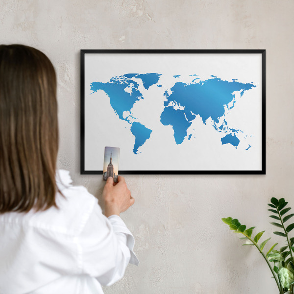 Vacation magnet board with a black frame World map