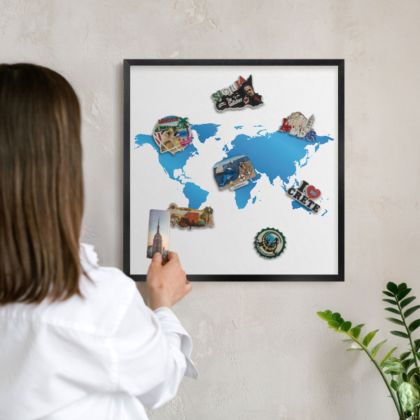 Vacation magnet board with a black frame World map