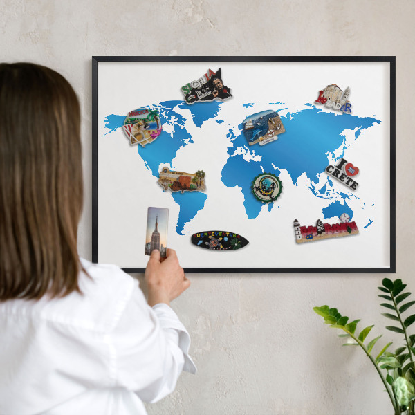 Vacation magnet board with a black frame World map