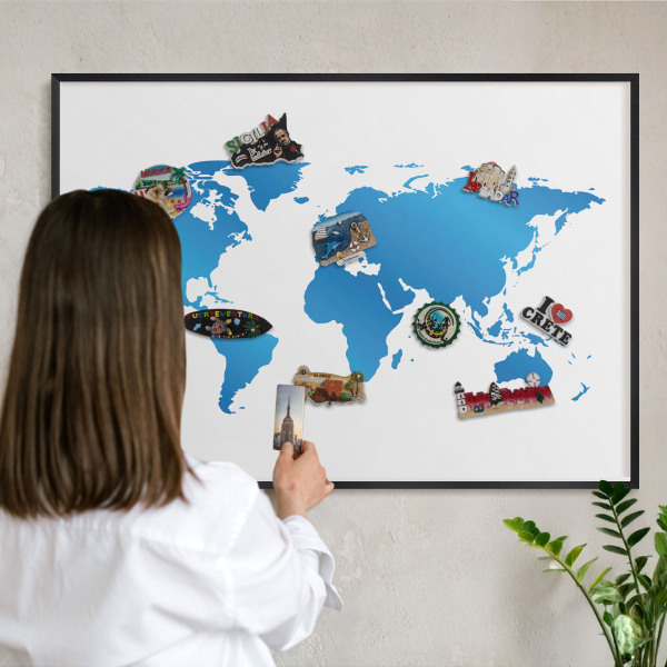 Vacation magnet board with a black frame World map
