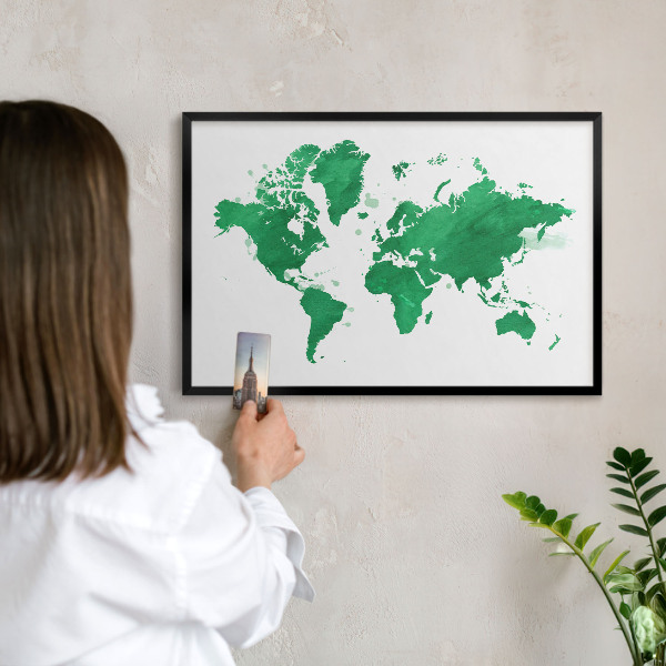 Metal wall board for magnets in a black frame Green map