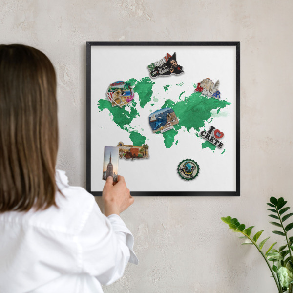 Metal wall board for magnets in a black frame Green map