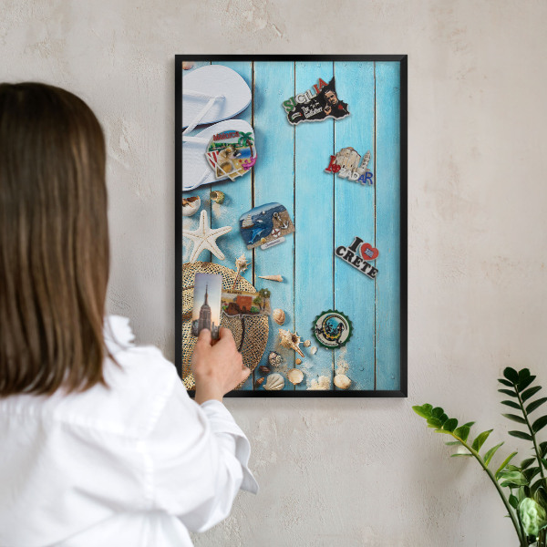 Metal wall board for magnets in a black frame Holiday atmosphere