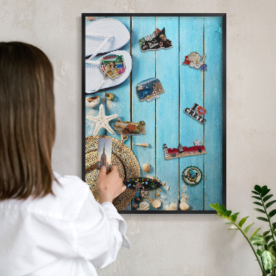 Metal wall board for magnets in a black frame Holiday atmosphere