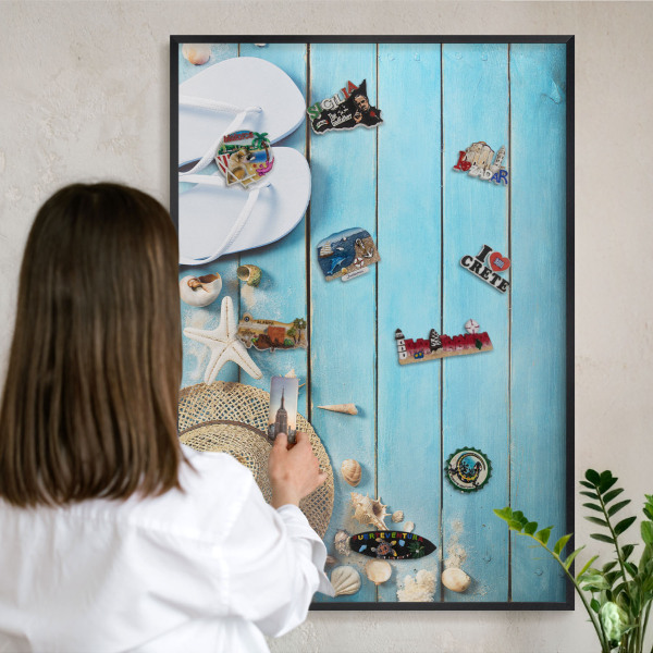 Metal wall board for magnets in a black frame Holiday atmosphere