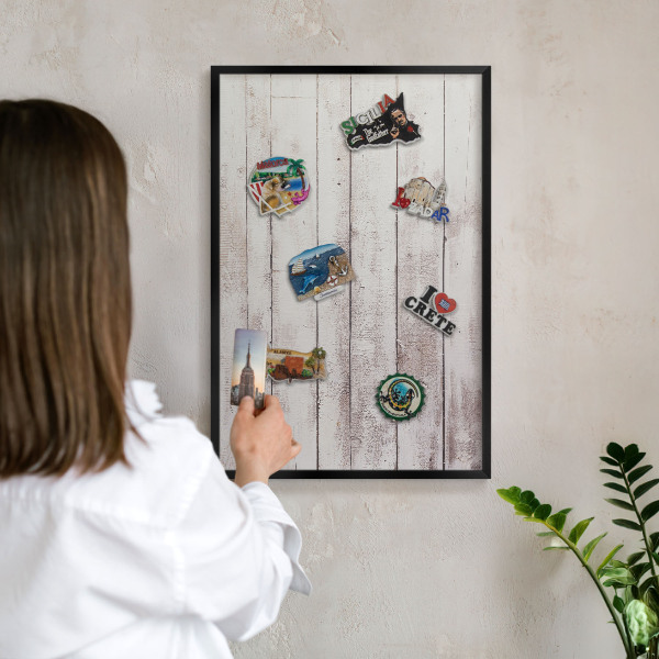 Vacation magnet board with a black frame Light wood