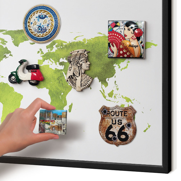 Vacation magnet board with a black frame Green map