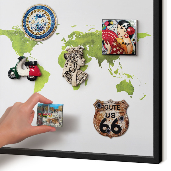 Vacation magnet board with a black frame Green map