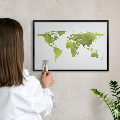 Vacation magnet board with a black frame Green map