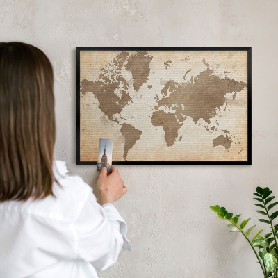 Metal wall board for magnets in a black frame World map