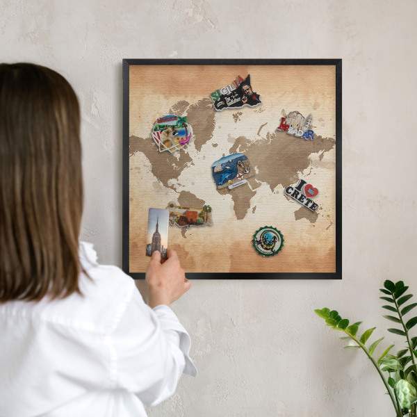 Metal wall board for magnets in a black frame World map