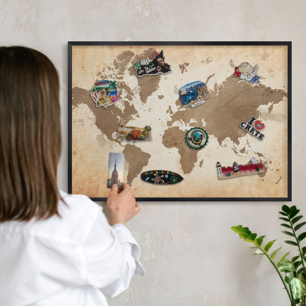 Metal wall board for magnets in a black frame World map