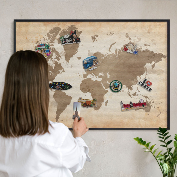 Metal wall board for magnets in a black frame World map