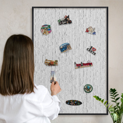 Vacation magnet board with a black frame Brick wall
