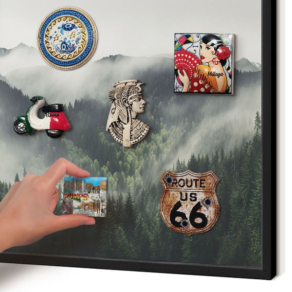 Vacation magnet board with a black frame Green mountains