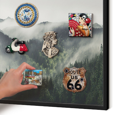 Vacation magnet board with a black frame Green mountains