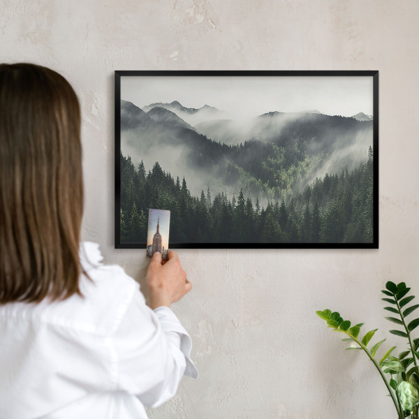 Vacation magnet board with a black frame Green mountains