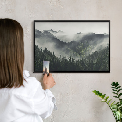 Vacation magnet board with a black frame Green mountains
