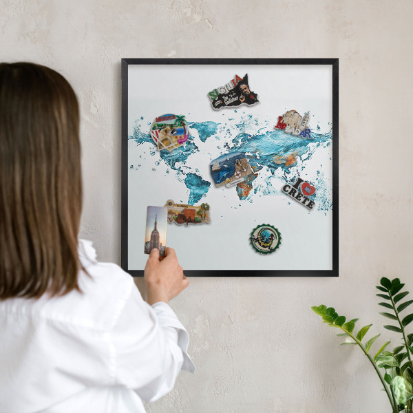 Vacation magnet board with a black frame Water map