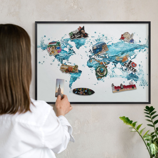 Vacation magnet board with a black frame Water map