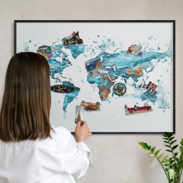 Vacation magnet board with a black frame Water map