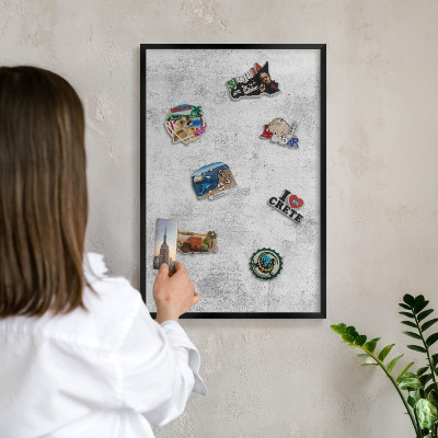 Vacation magnet board with a black frame Raw concrete