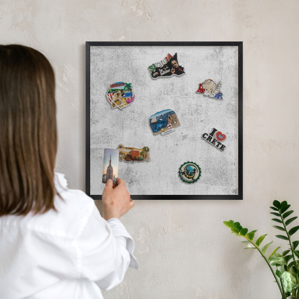 Vacation magnet board with a black frame Raw concrete