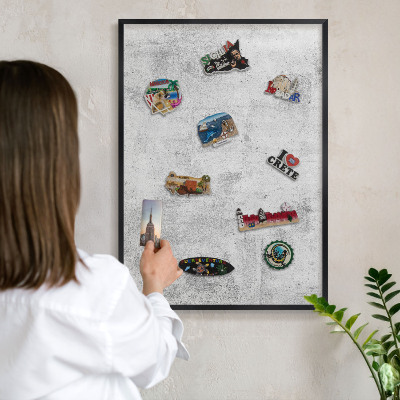 Vacation magnet board with a black frame Raw concrete