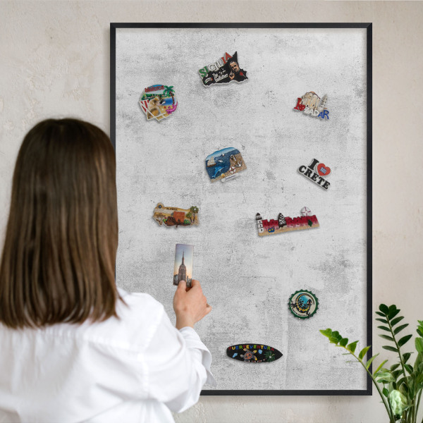 Vacation magnet board with a black frame Raw concrete