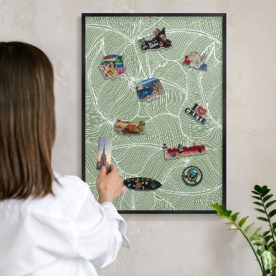 Metal wall board for magnets in a black frame Tropical leaves