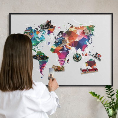 Vacation magnet board with a black frame World map