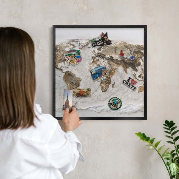 Metal wall board for magnets in a black frame Relief map