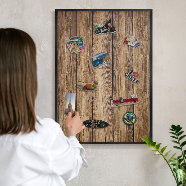 Vacation magnet board with a black frame Wooden texture