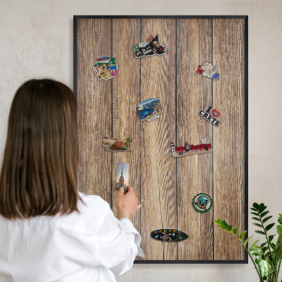 Vacation magnet board with a black frame Wooden texture