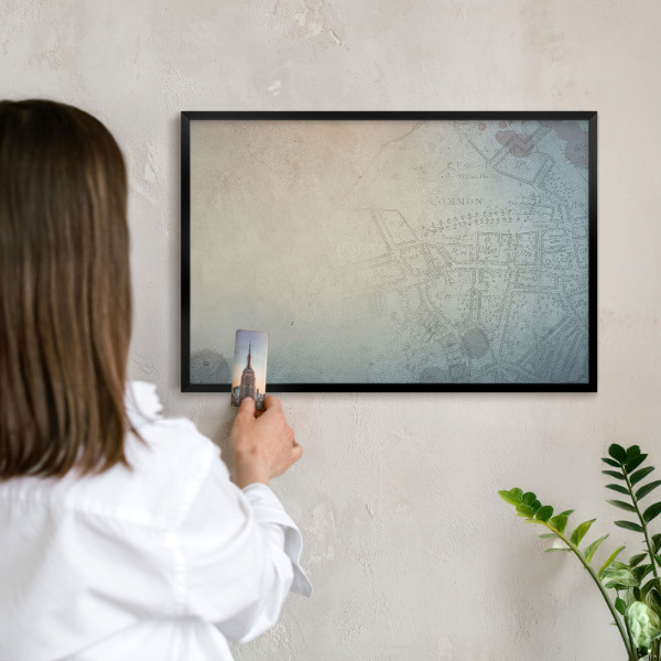 Vacation magnet board with a black frame Old map
