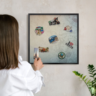 Vacation magnet board with a black frame Old map