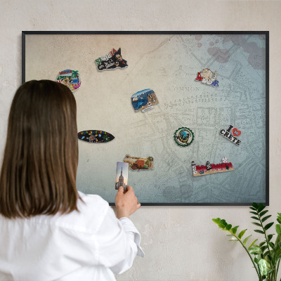 Vacation magnet board with a black frame Old map