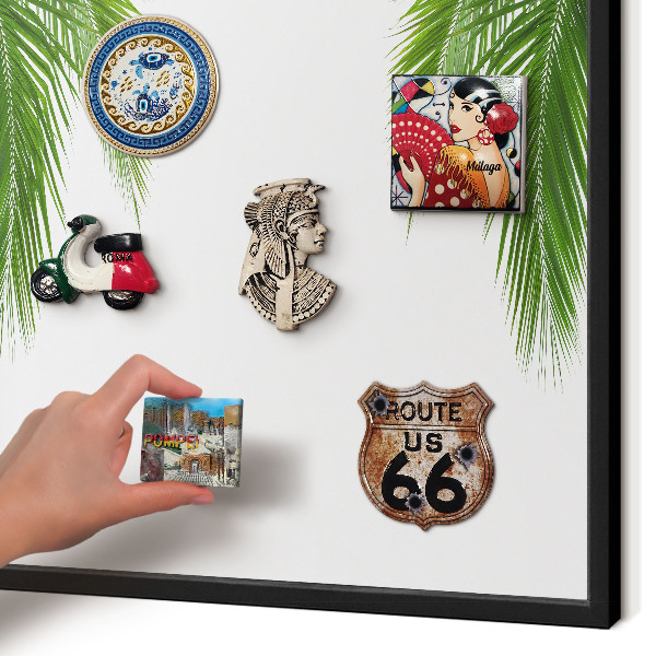 Metal wall board for magnets in a black frame Exotic nature