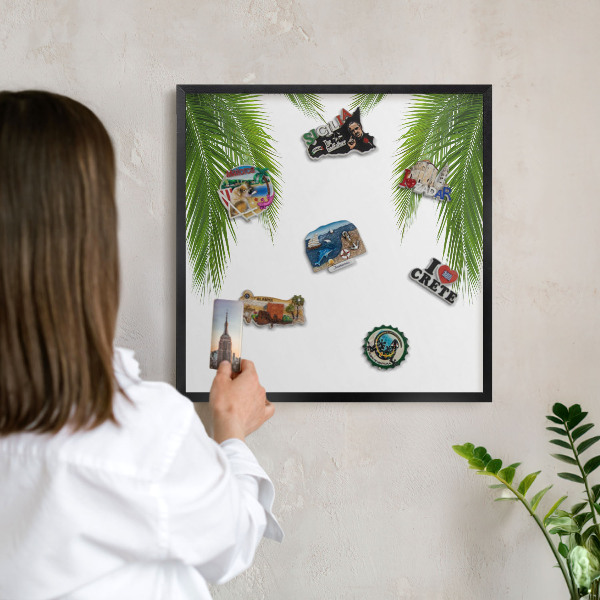 Metal wall board for magnets in a black frame Exotic nature