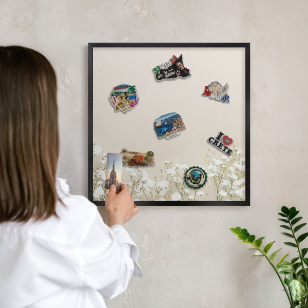 Vacation magnet board with a black frame Subtle nature