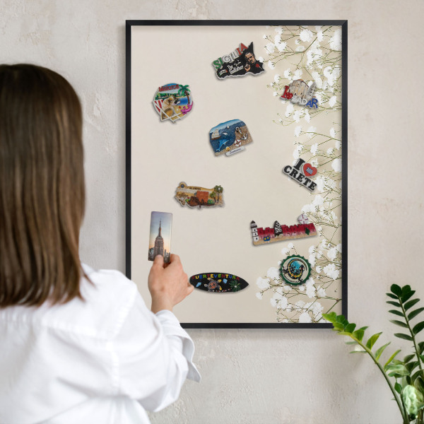 Vacation magnet board with a black frame Subtle nature