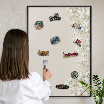 Vacation magnet board with a black frame Subtle nature