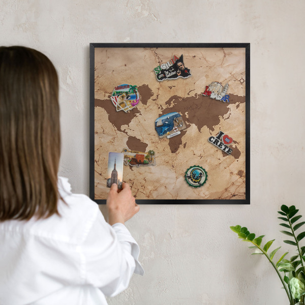Metal wall board for magnets in a black frame World map