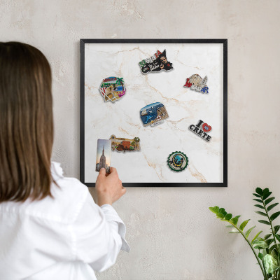 Metal wall board for magnets in a black frame Marble elegance