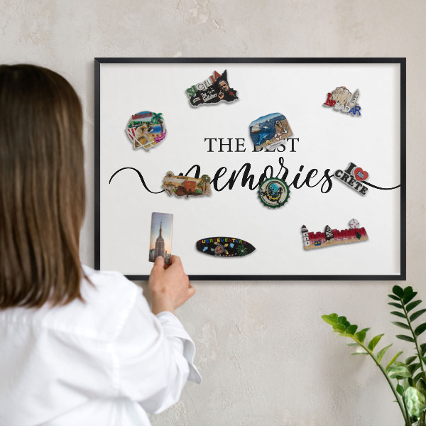 Vacation magnet board with a black frame Inspiring memories