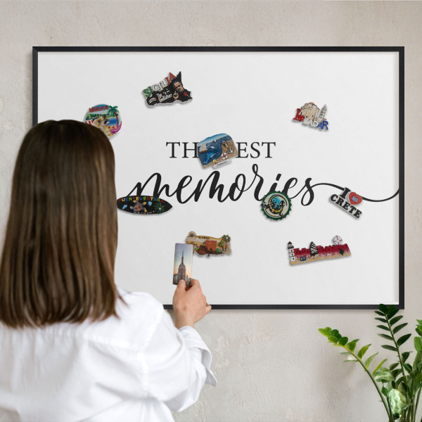 Vacation magnet board with a black frame Inspiring memories